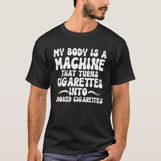 CAMISETA MEU CORPO É UMA MÁQUINA QUE TRANSFORMA CIGARROS EM (Frente)