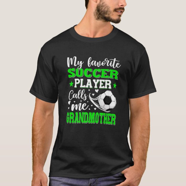 Camiseta Meu Jogador De Futebol Favorito Me Chama Avó Mot (Frente)