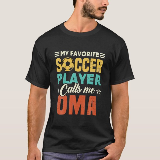 Camiseta Meu Jogador De Futebol Favorito Me Chama De Oma Vi (Frente)