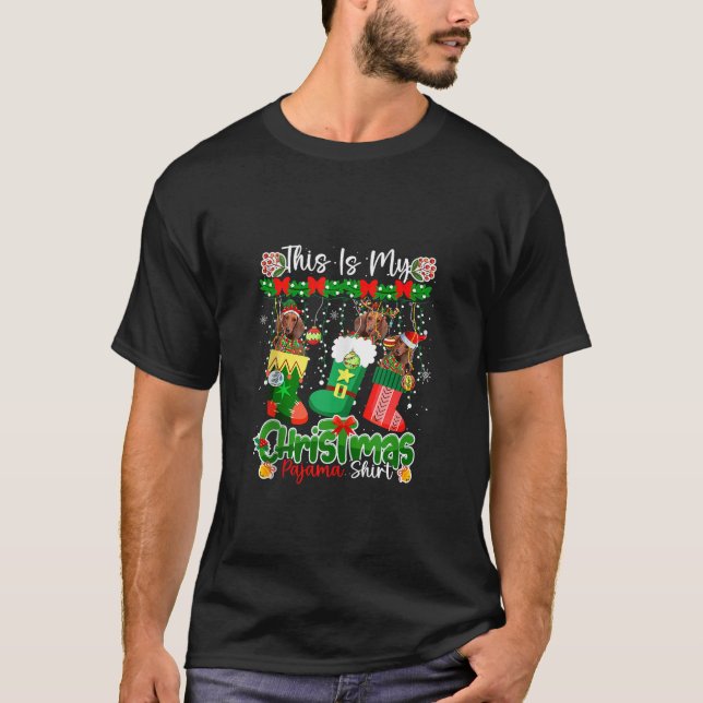Camiseta Meu Natal Pajama Mostra Papais noeis De Saquis Em  (Frente)