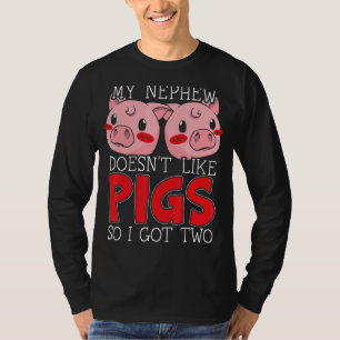 Camiseta Meu sobrinho não gosta de porcos, então tenho duas