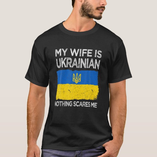 Camiseta Minha Esposa É O Orgulho De Raízes Do Patrimônio U (Frente)