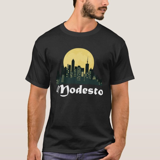 Camiseta Modesto Skyline Lua Brilhante Noite da Cidade do M (Frente)