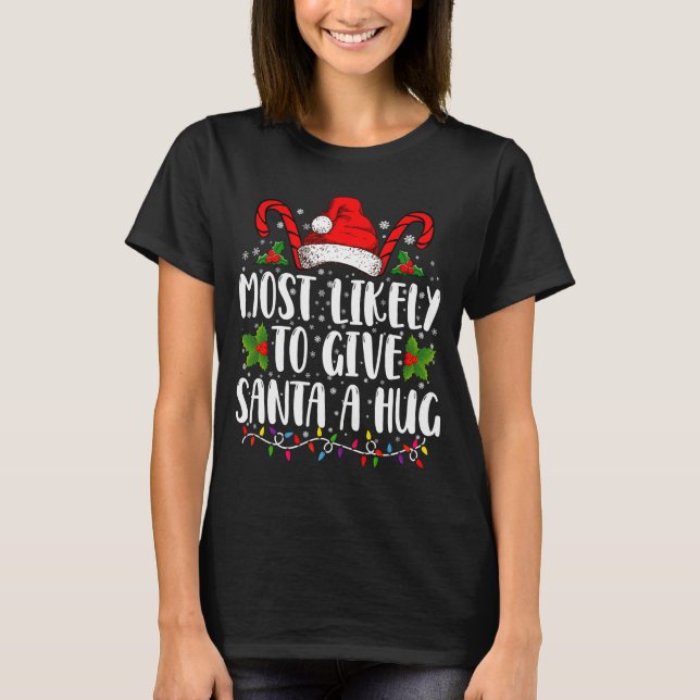 Camiseta Most Likely To Give Santa A Hug Ing Family Xmas  (Frente)