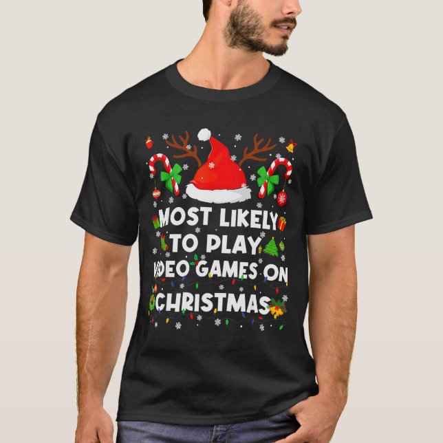 Camiseta Most Likely To Play Video Game On Pjs Christmas Xm (Frente)