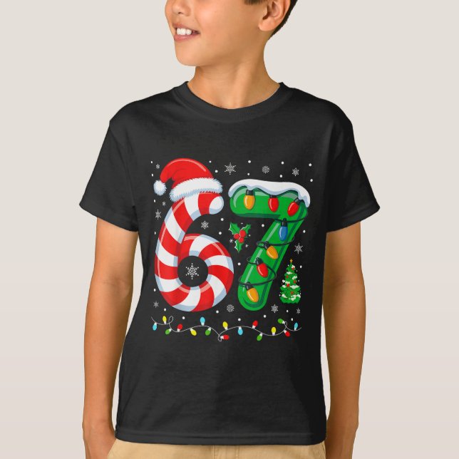 Camiseta Most Likely To Say 67 Christmas Matching 7 6 Famil (Frente)