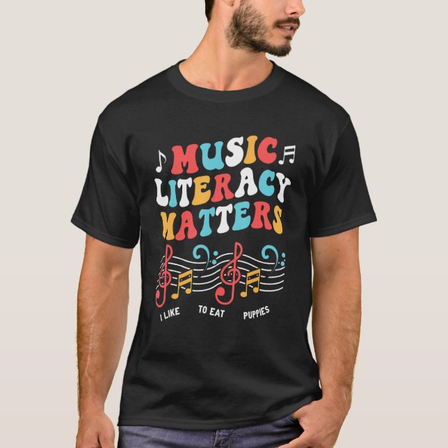 Camiseta Music Literacy Matters I Like to Eat Puppies  Musi (Frente)
