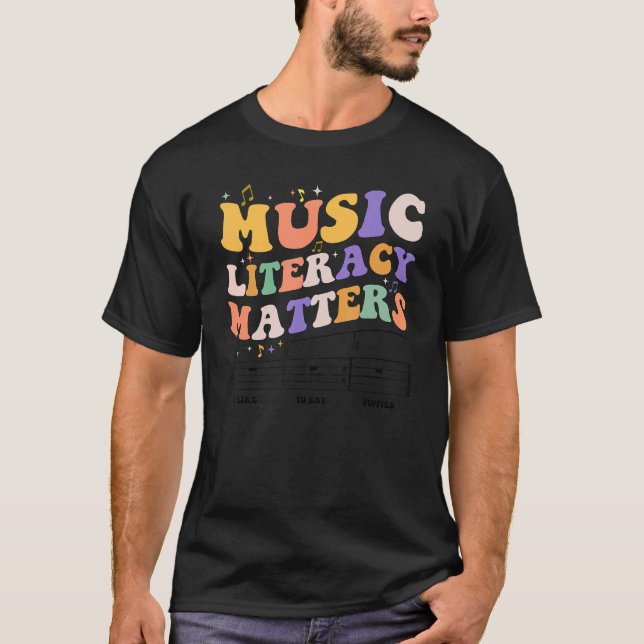 Camiseta Música Literacia Importa Que Eu Gosto De Comer Mús (Frente)