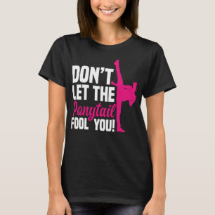 Camiseta Não deixe que o rabo-de-cavalo te engane uma garot