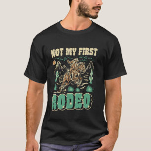 Camiseta Não é Meu Primeiro Rodeio Cowboy Cavalo Equestre O