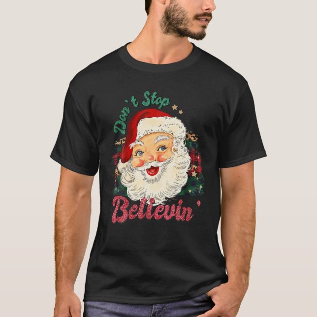Camiseta Não pare de acreditar em Papais noeis de Natal (Frente)