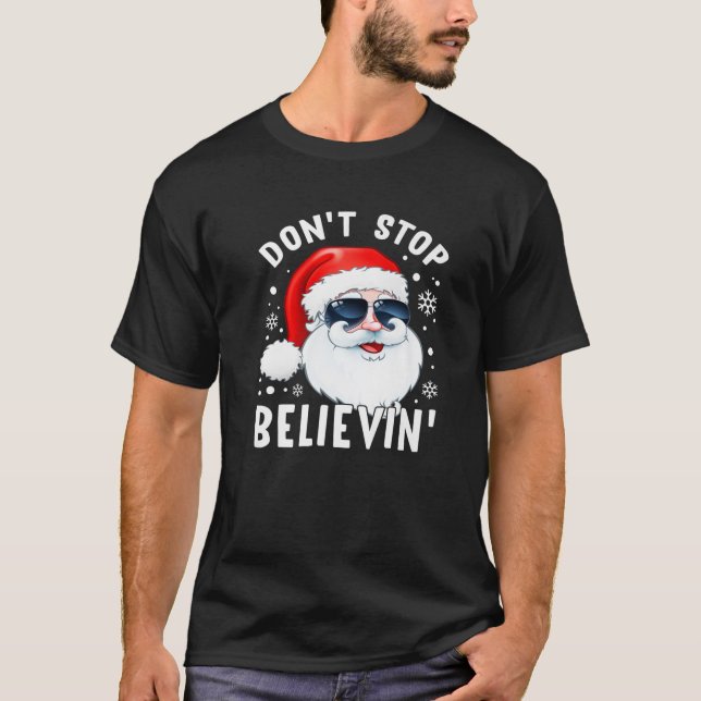 Camiseta Não pare de acreditar no Papai Noel. (Frente)
