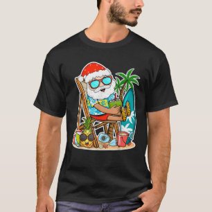 Camiseta Natal do Verão em julho Papais noeis tropicais sur