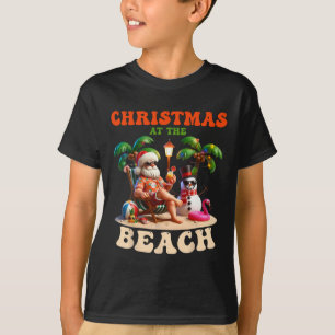 Camiseta Natal Na Praia Xmas Em Julho Boneco de Neve Flamin