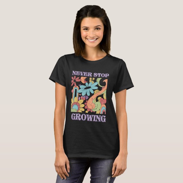 Camiseta Never Stop Growing Retro  (Frente Completa)