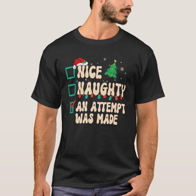 Camiseta Nice Naughty An Attempt Was Made Christmas List Sa (Frente)
