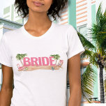 Camiseta Noiva de Festa de solteira de praia rosa<br><div class="desc">Bachelorette Tropical Praia Rosa Bonita Para Ser Camisa-T. Um tema legal de praia aquarela com tons cor-de-rosa e cor-de-rosa, colocando a vibração para uma fuga de praia com a noiva e seus besties. De viagens à Flórida, Califórnia, ou até mesmo algo mais internacional como México, Havaí ou Bahamas, este fim...</div>