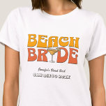Camiseta Noiva de Praia do Retro Groovy Beach Festa de solt<br><div class="desc">Faça um salto na sua próxima festa de solteira com esta festa de solteira de praia impressionante, camisetas personalizadas. Quer estejas a celebrar uma viagem de praia, férias de raparigas, ou um feriado de melhores amigos, esta camiseta de festa de solteira de praia personalizada é o complemento perfeito para a...</div>