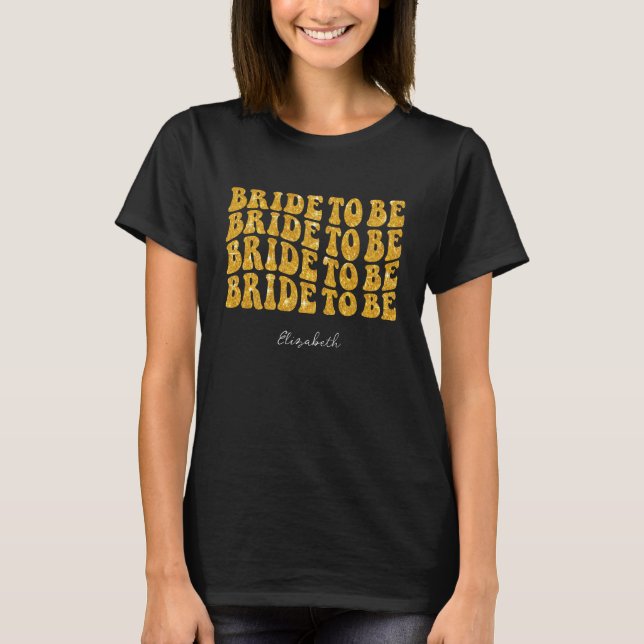 Camiseta Noiva para ser Dourada com texto brilhante com nom (Frente)