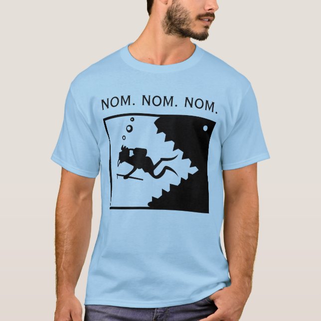 Camiseta Nom. Nom. Nom. (Frente)