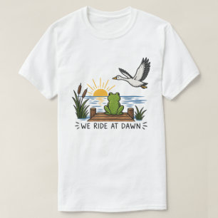 Camiseta Nós Cavalgamos Ao Amanhecer Sapo Ganso Lago Pôr do