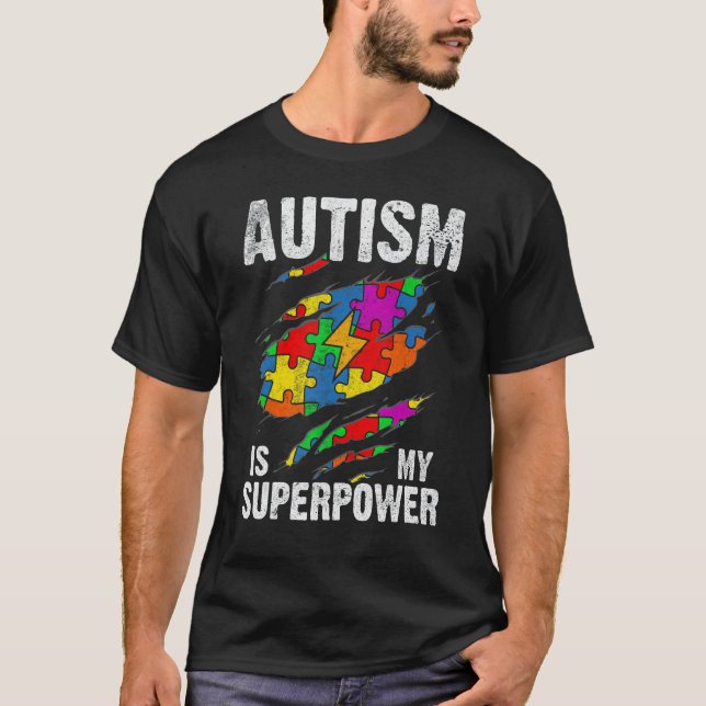 Camiseta O Autismo é Meu Super Poder Super-Herói Conscienti (Frente)