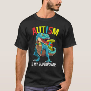 Camiseta O Autismo É Meu Superpoder Dinosaur Puzzle Piece