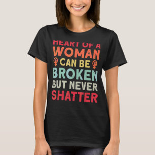Camiseta O Coração De Uma Mulher Pode Ser Quebrado, Mas Nun
