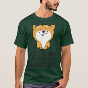 Camiseta O dono do cachorro Shiba Inu é apenas um menino qu