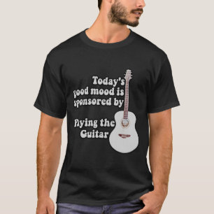 Camiseta O humor de hoje é patrocinado pela guitarra.