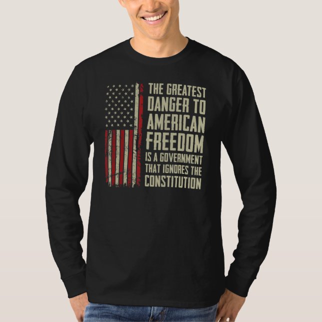 Camiseta O Maior Perigo Para A Liberdade Americana - Bandei (Frente)