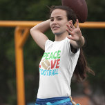 Camiseta O Natal do Peace Love<br><div class="desc">Futebol do Peace Love. Um presente de Natal bonito para um jogador de futebol ou fã. Este design desportivo legal é verde,  vermelho e azul com a bola no centro.</div>