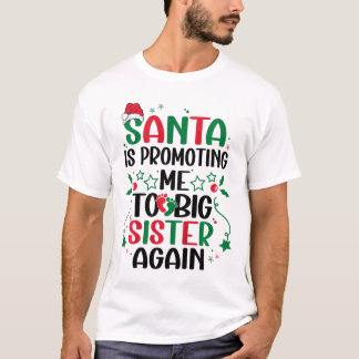 Camiseta O Papai Noel Está Me Promovendo a Irmã Mais Velha