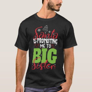 Camiseta O Papai Noel Está Me Promovendo a Irmã Mais Velha