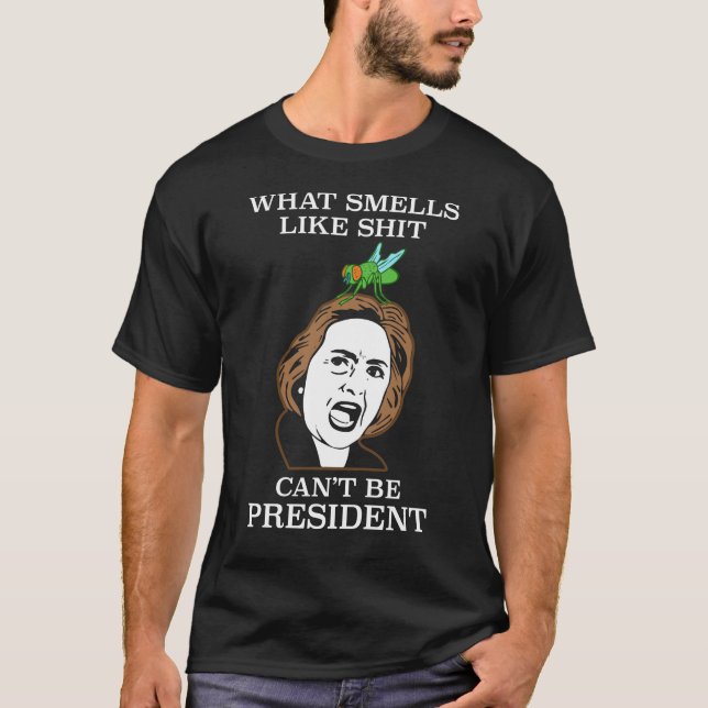 Camiseta O que cheira como sh não pode ser presidente (Frente)