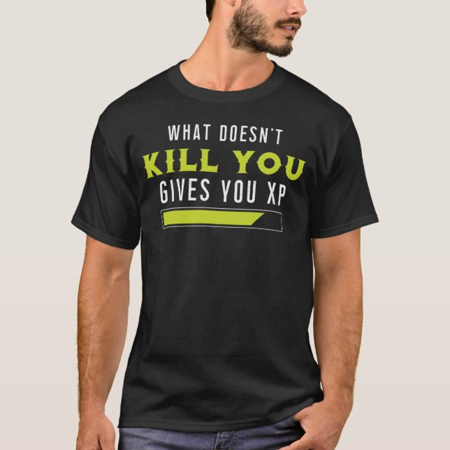 Camiseta O que você não Matar que lhe dá o XP dizendo (Frente)