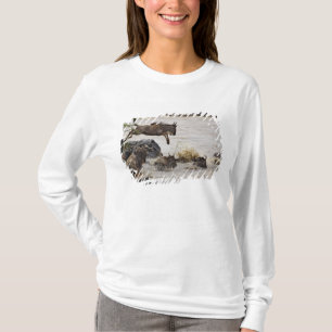 Camiseta O Wildebeest que salta no rio de Mara durante
