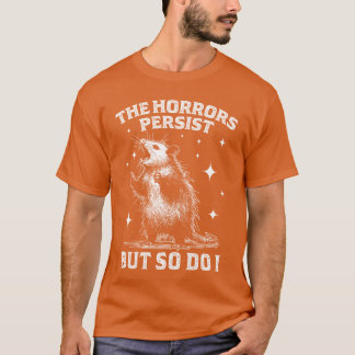 Camiseta Os Horrores Persistem Mas Eu Também Retro Raccon E