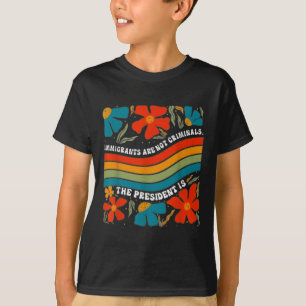 Camiseta Os Imigrantes Não São Criminosos, Mas O Presidente