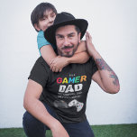 Camiseta PAI Colorida legal 'GAMER' | DIA DE OS PAIS<br><div class="desc">Uma t-shirt para pais "LEGAL"! Esta camiseta foi projetada para pais que adoram jogar videos games,  apresentando a divertida frase 'Eu sou um pai de jogador. Como um pai normal,  só muito mais frio'.</div>