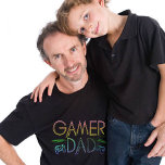 Camiseta PAI Colorida legal 'GAMER' | Dia de os pais T-Shir<br><div class="desc">PAI Colorida legal 'GAMER' | Camiseta T-Shirt A Dia de os pais para pais "LEGAL"! Esta camiseta foi projetada para pais que adoram jogar videos games, apresentando a divertida frase 'Eu sou um pai de jogador. Como um pai normal, só muito mais frio'. Este design de t-shirt gráfica apresenta o...</div>