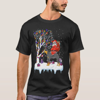Camiseta Papai Noel Montado em Luzes de Árvore de Cachorro 