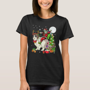Camiseta Papai Noel Montado em Rena Gato de Pelúcia Árvore 