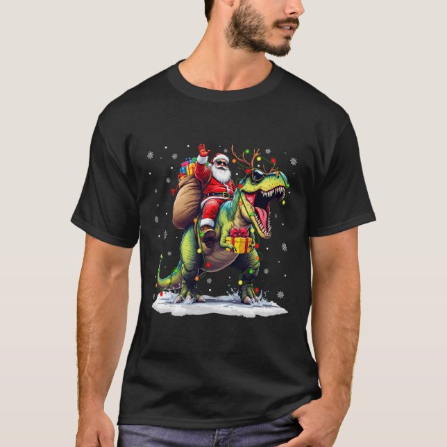 Camiseta Papai Noel montando dinossauro T Rex Natal Meninos (Frente)
