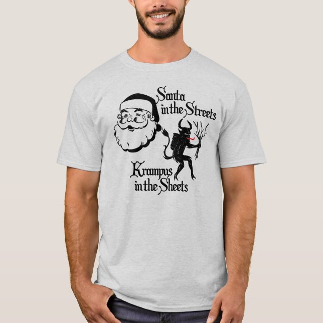 Camiseta Papai noel nas ruas. Krampus nas folhas (Frente)
