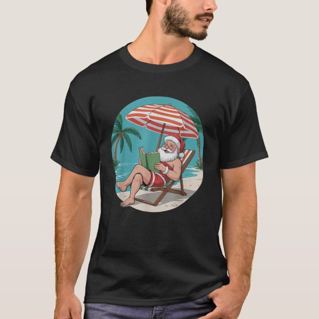 Camiseta Papai Noel Relaxa No Livro De Leitura Da Praia Ver (Frente)