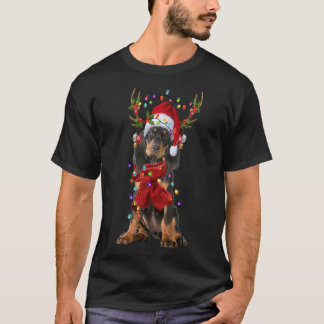 Camiseta Papais noeis Black and Tan Coonhound Dog Reindeer 