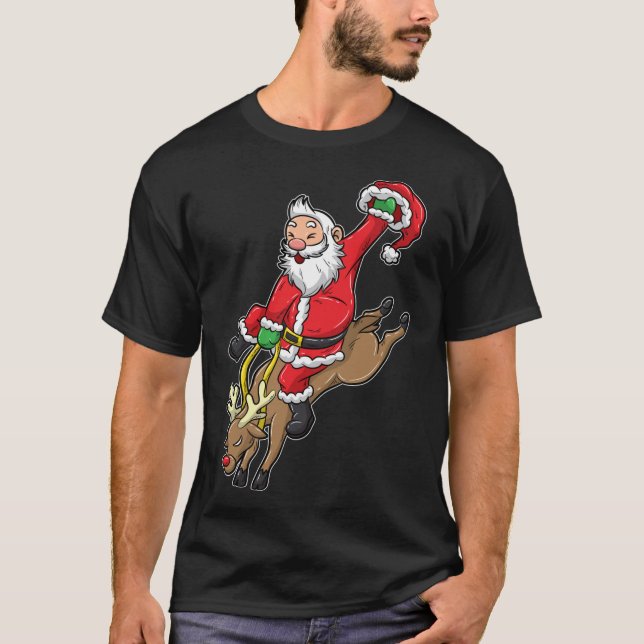 Camiseta Papais noeis De Cowboy Xmas Reindeer Rodeo Natal E (Frente)