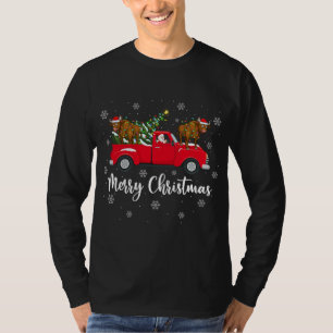 Camiseta Papais noeis Que Andam Na Árvore De Natal Caminhão