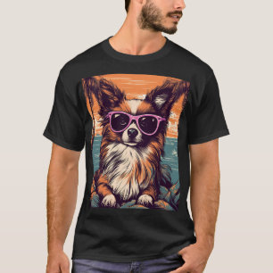 Camiseta Papillon com óculos Sunitas na praia
